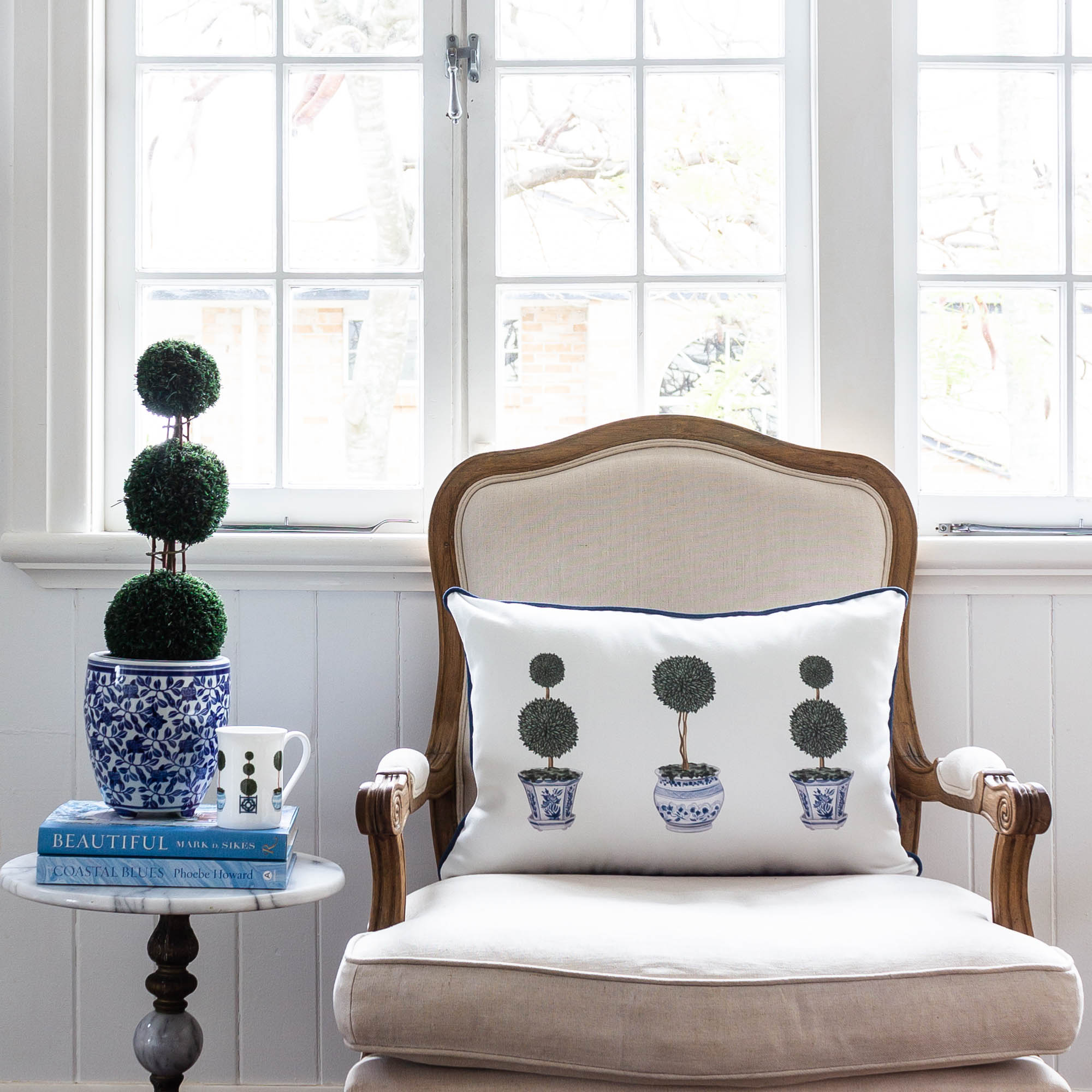 chinoiserie topiary piped cushion